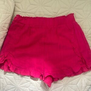 New in pink shorts with pockets! Rarely worn!